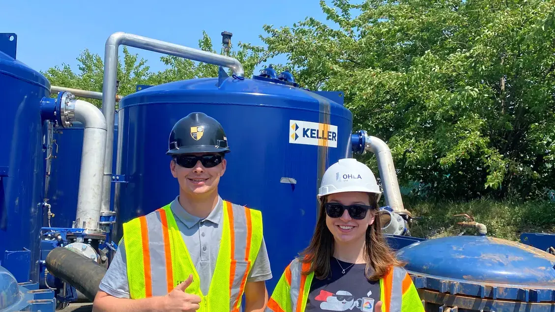 2 Keller employees giving thumbs up