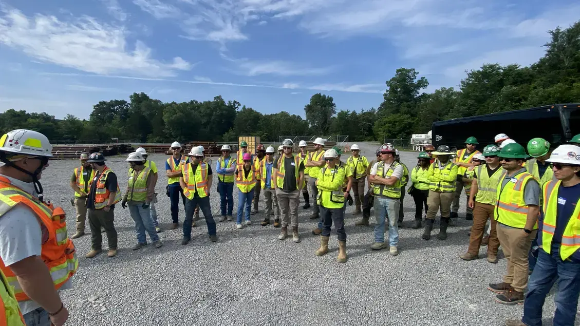 Keller employees in a hald circle