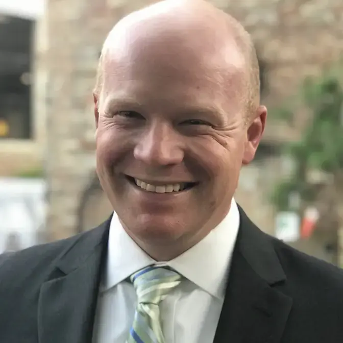 man in black suit