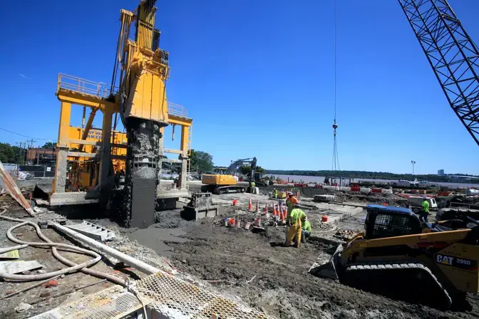 Constructing the TRD wall at Robinson Landing.