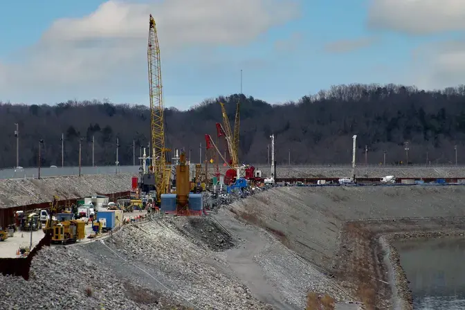 Working on Wolf Creek Dam