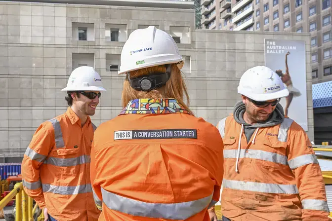 Woman and two men on site