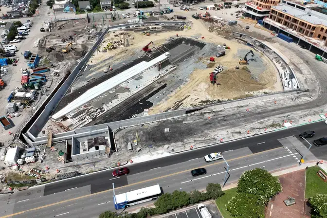 aerial view of a triangular construction site