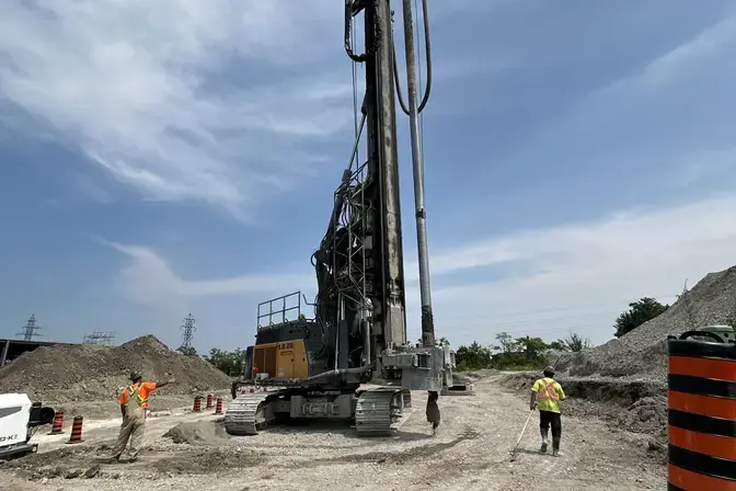 rig being transported across a job site