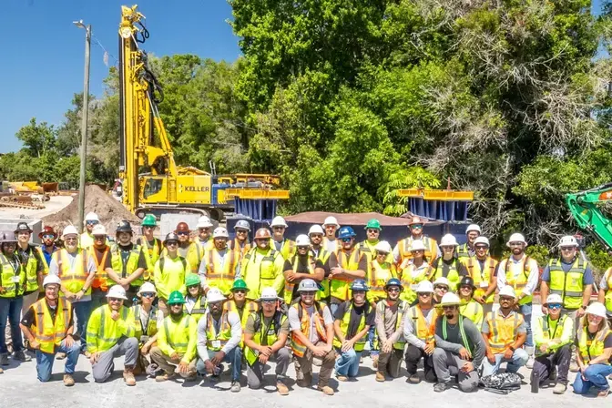 Large group of Keller employees posing for a photo
