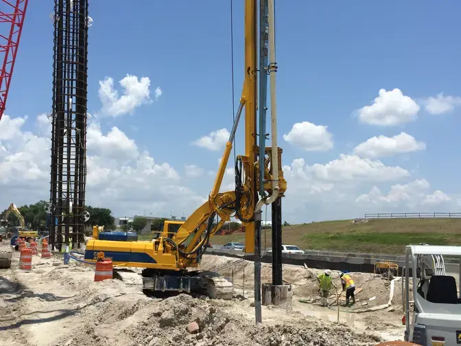 Installing drilled shafts to support the bride reconstruction.
