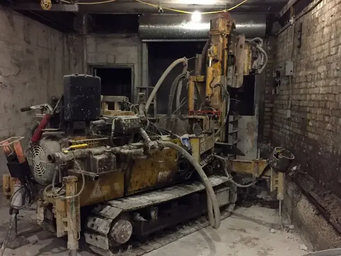 Installing micropiles in low headroom