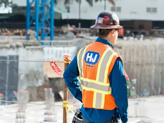 Worker in HJ vest