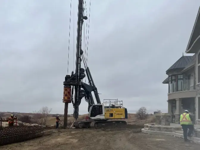 drilled shaft installation near residential home