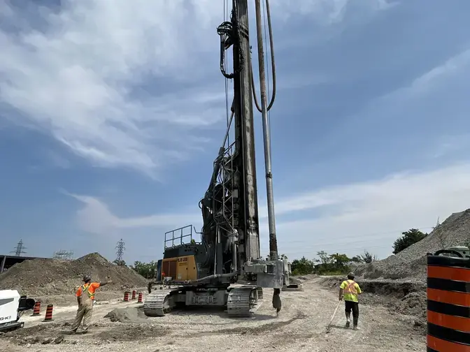 rig being transported across a job site