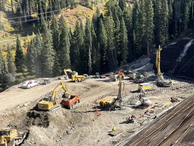 construction at the base of a slope