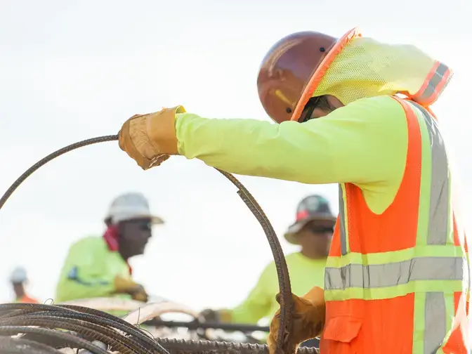 Keller employee working with steel