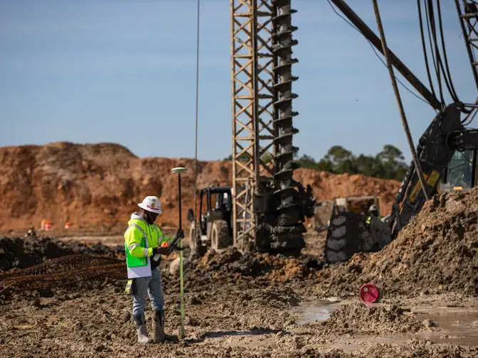 Keller employee surveying