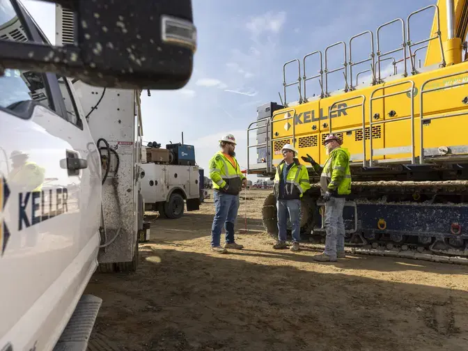 Three Keller employees talking