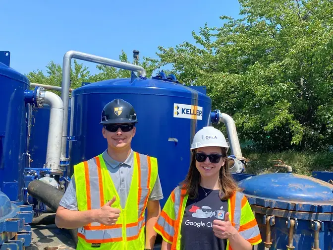 2 Keller employees giving thumbs up