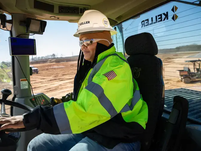 Keller employee driving a piece of machinery