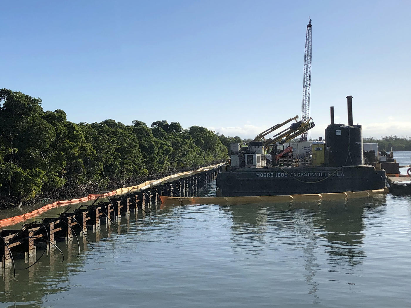 Installing anchors from a barge