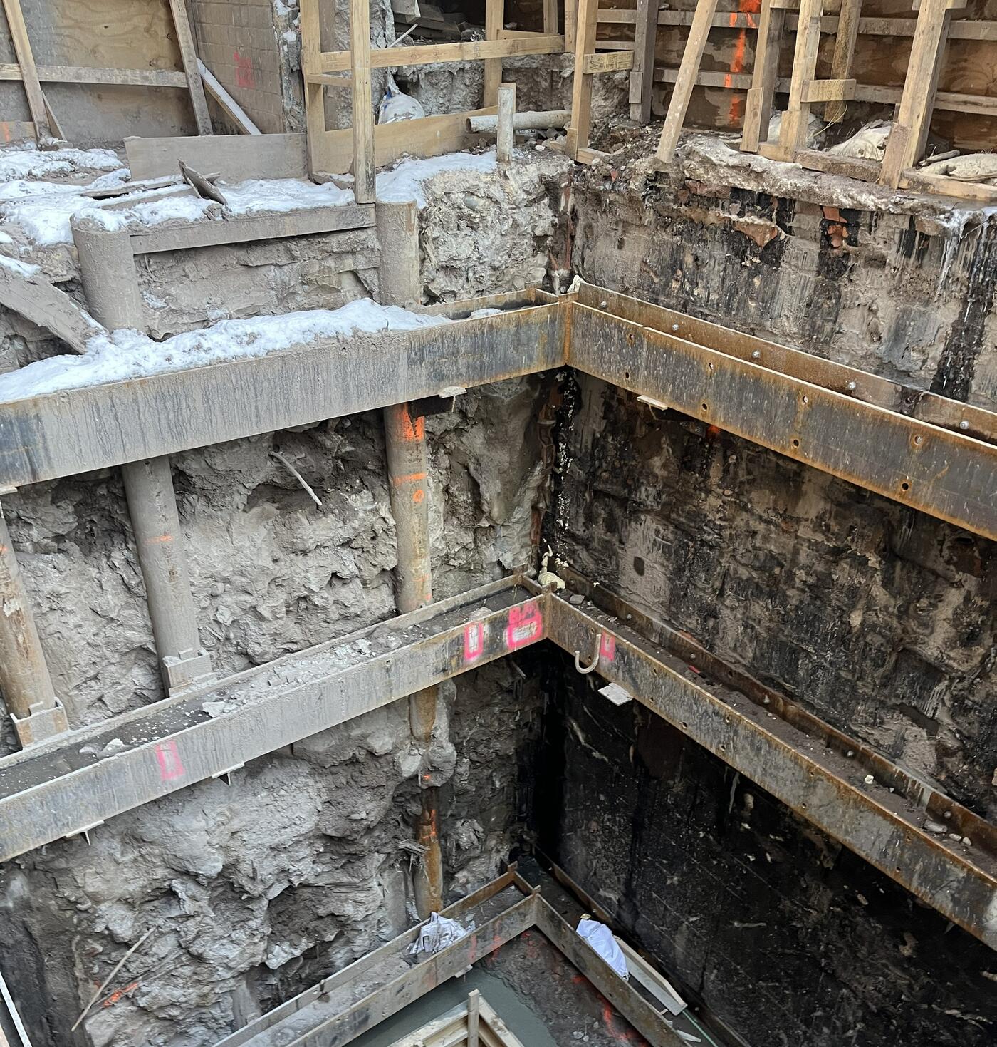 completed excavation showing micropiles and jet lagging with steel reinforcement