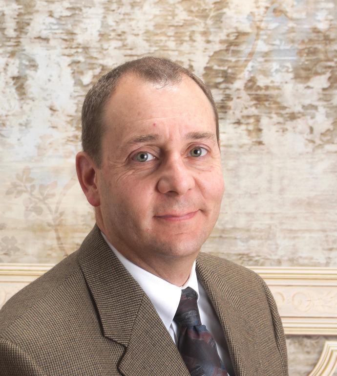 man in brown suit