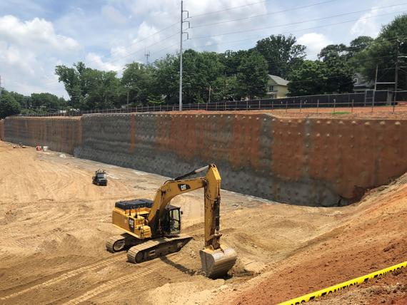 soil nail wall with excavator in front