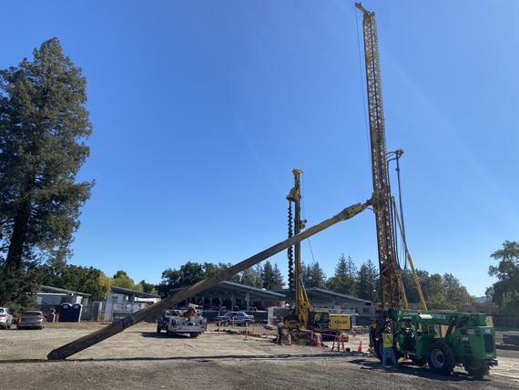 construction site with three rigs