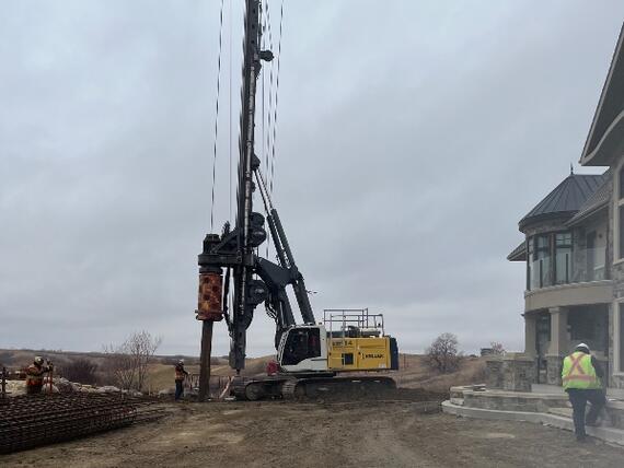 drilled shaft installation near residential home