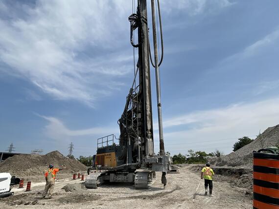 rig being transported across a job site