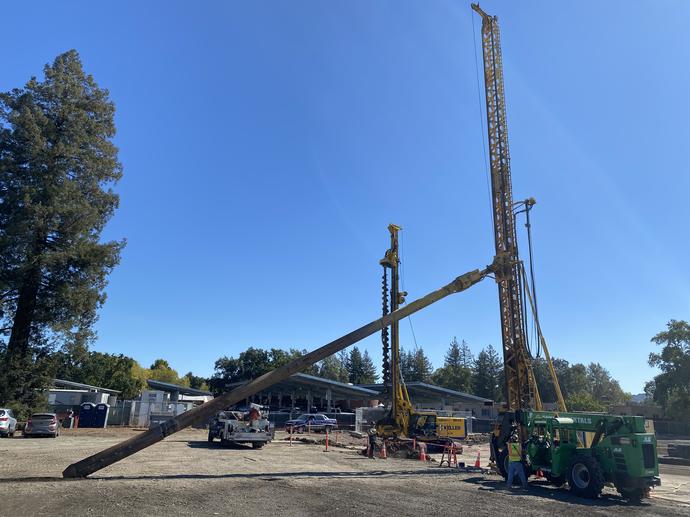 construction site with three rigs